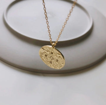 Map coin necklace