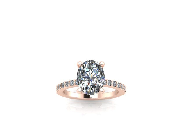 Oval diamond accent engagement ring