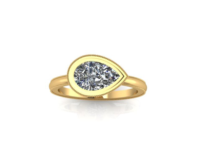 Solitaire pear engagament ring