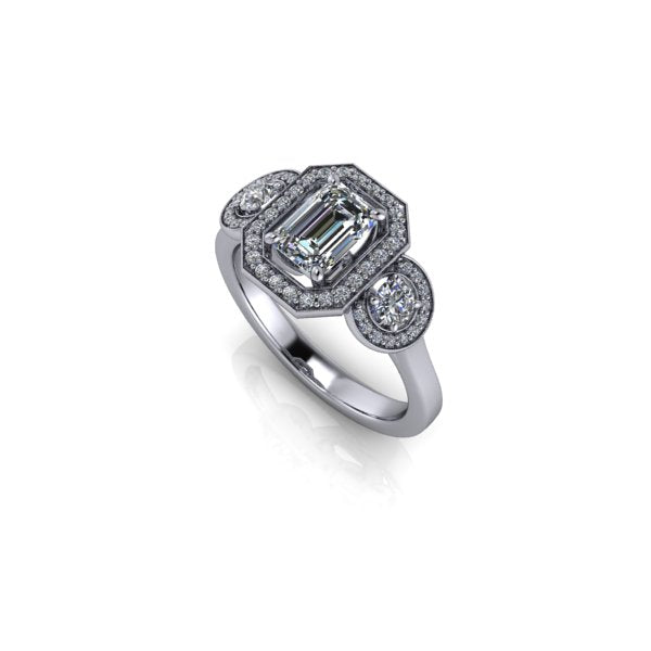 Emerald three stone halo engagement ring